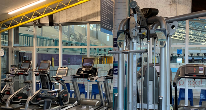 Takapuna Gym, equipped with treadmills, stationary bikes and weight machines.