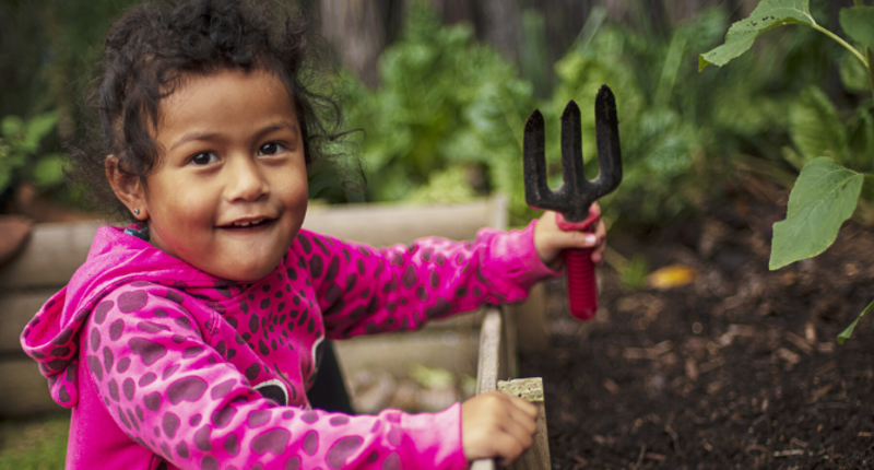 Generic kauri kids young girl with garden fork