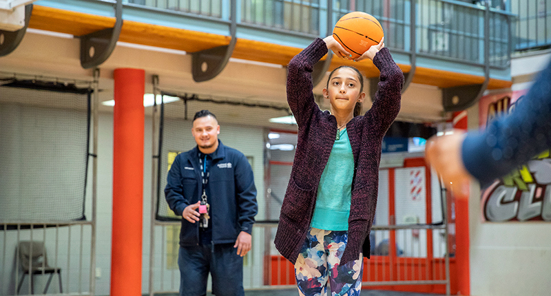 Girl poised ready to shoot a basketball